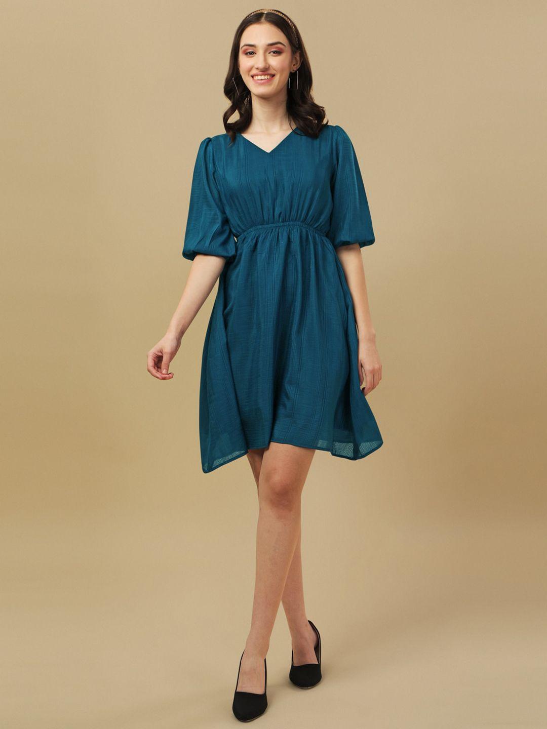 white world teal dress