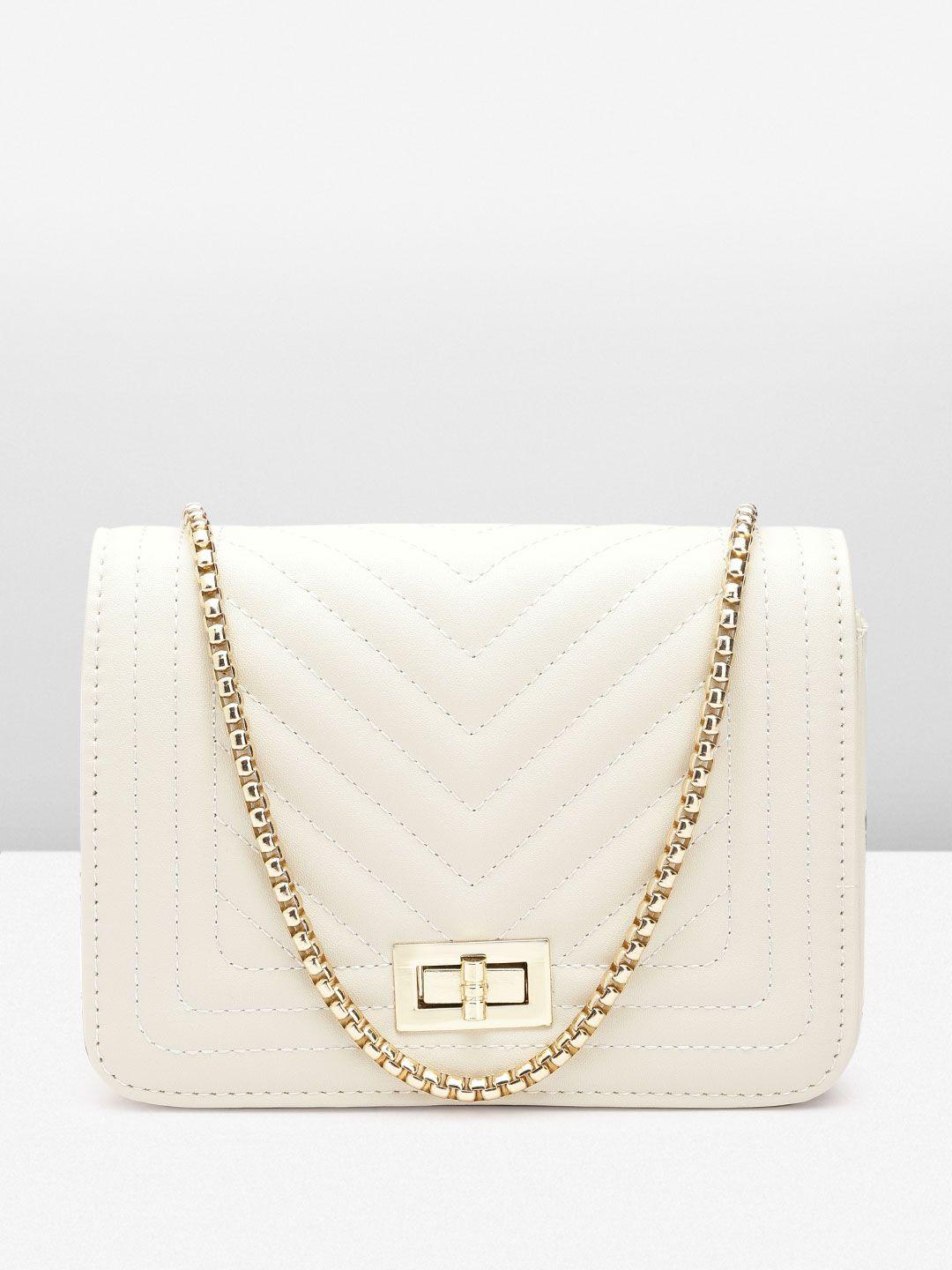 lino perros structured sling bag with quilted detail