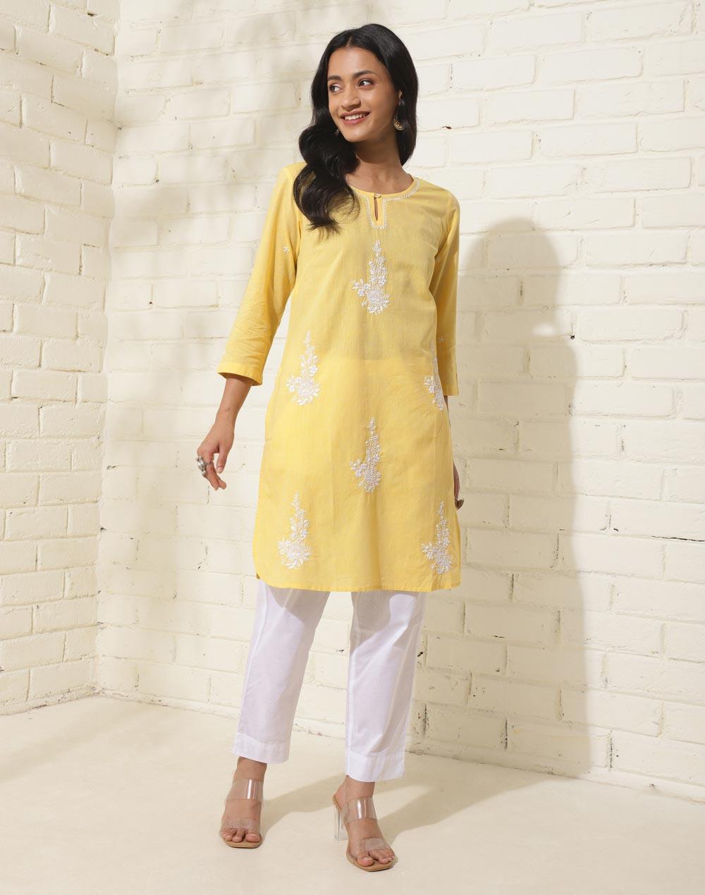 yellow cotton chikankari mid short kurta