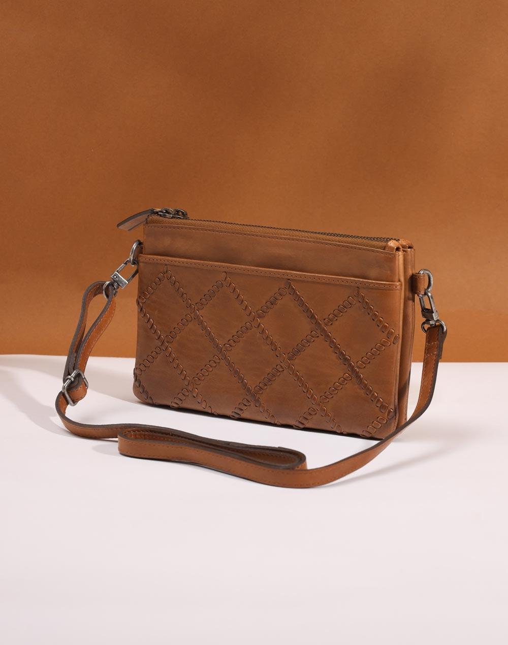 brown leather sling