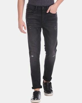 distressed skinny jeans