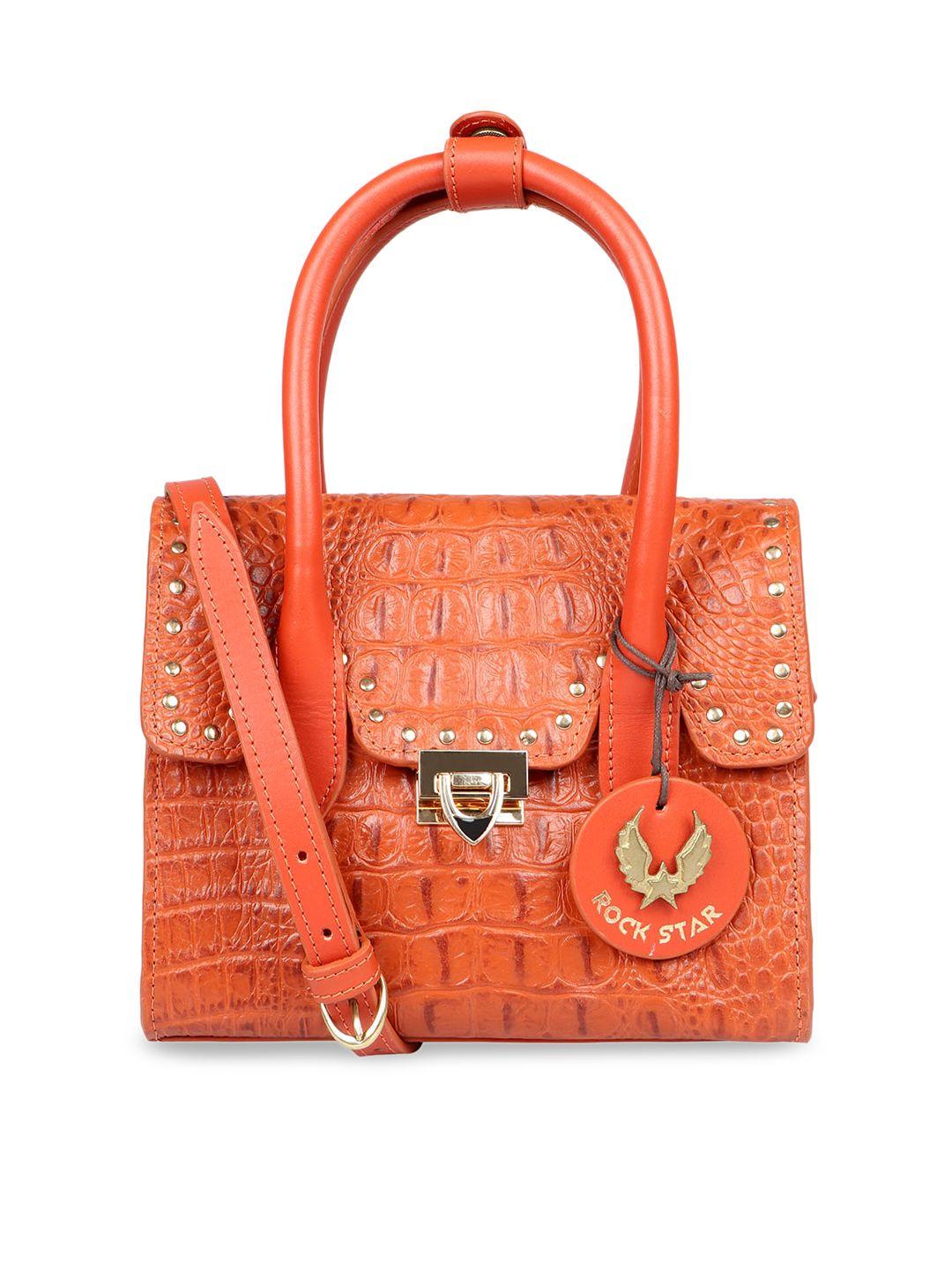 hidesign orange embellished leather handheld bag