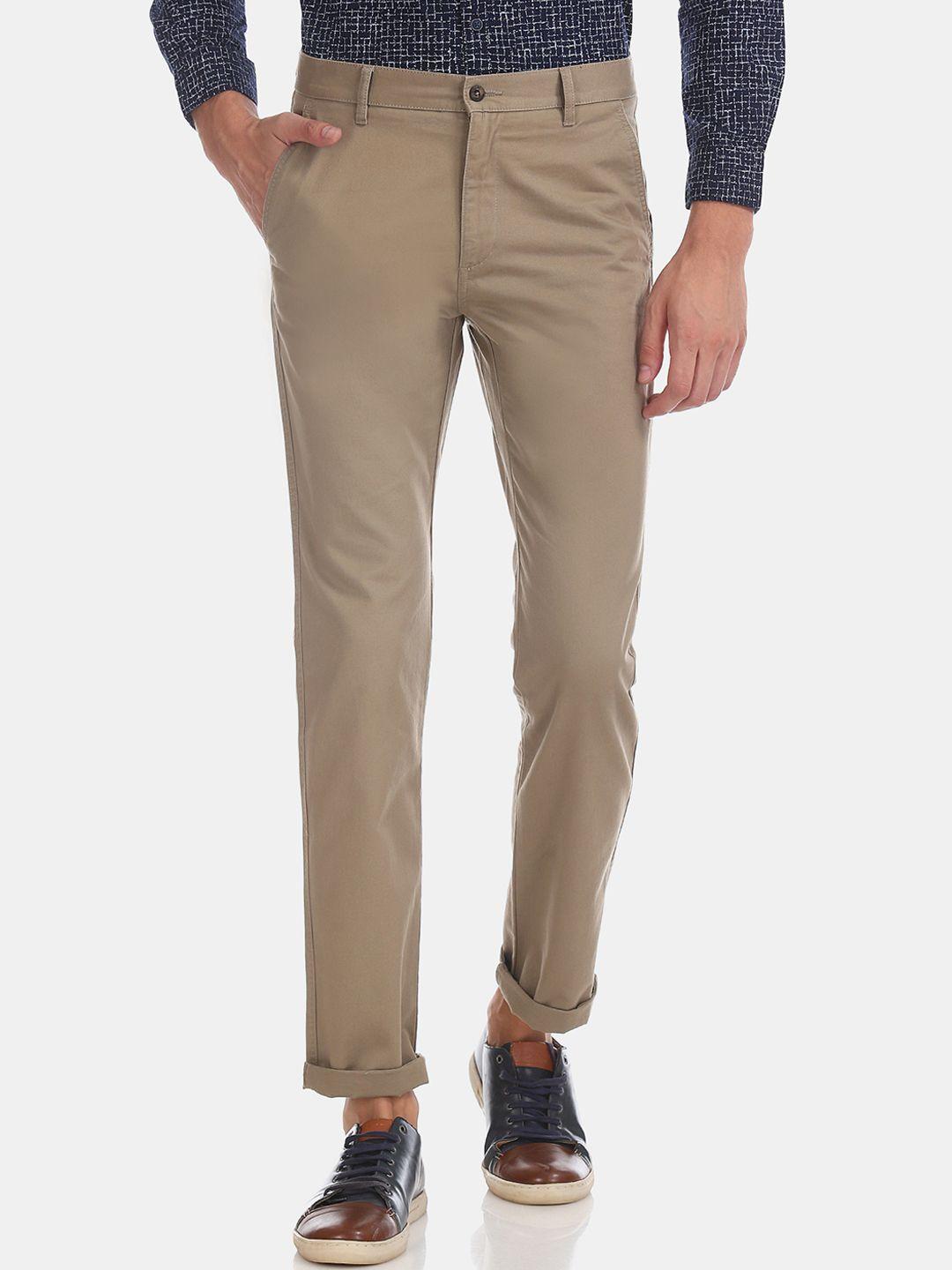 ruggers men beige slim fit solid regular trousers