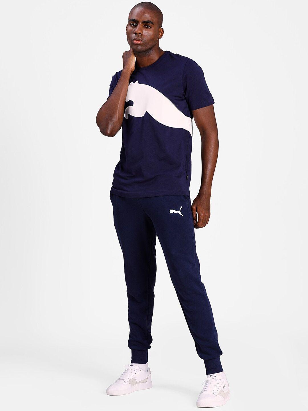 puma men navy blue solid ess logo pants