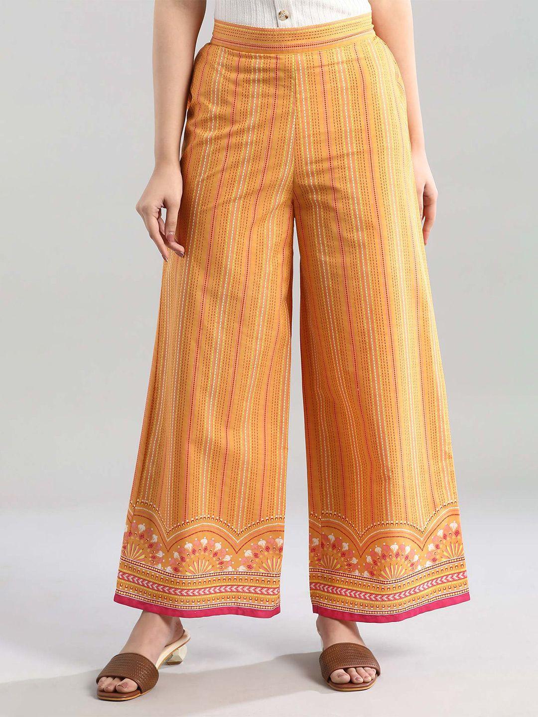 aurelia women yellow & red geometric printed loose fit woven ethnic palazzos