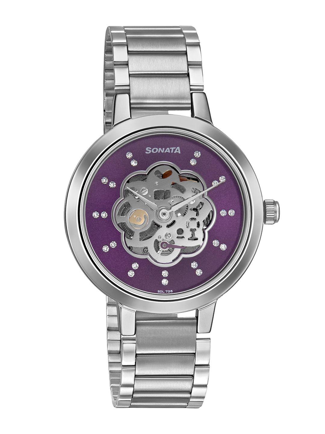 sonata women purple brass skeleton dial & silver toned bracelet style straps analogue watch 8141sm13