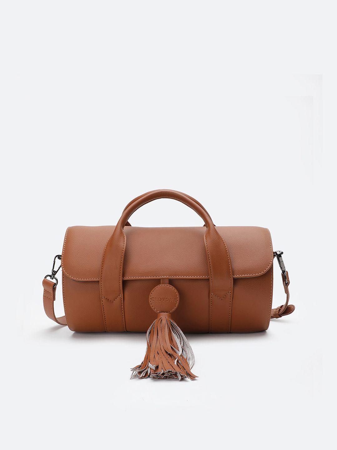 clotche tan pu structured handheld bag with tasselled