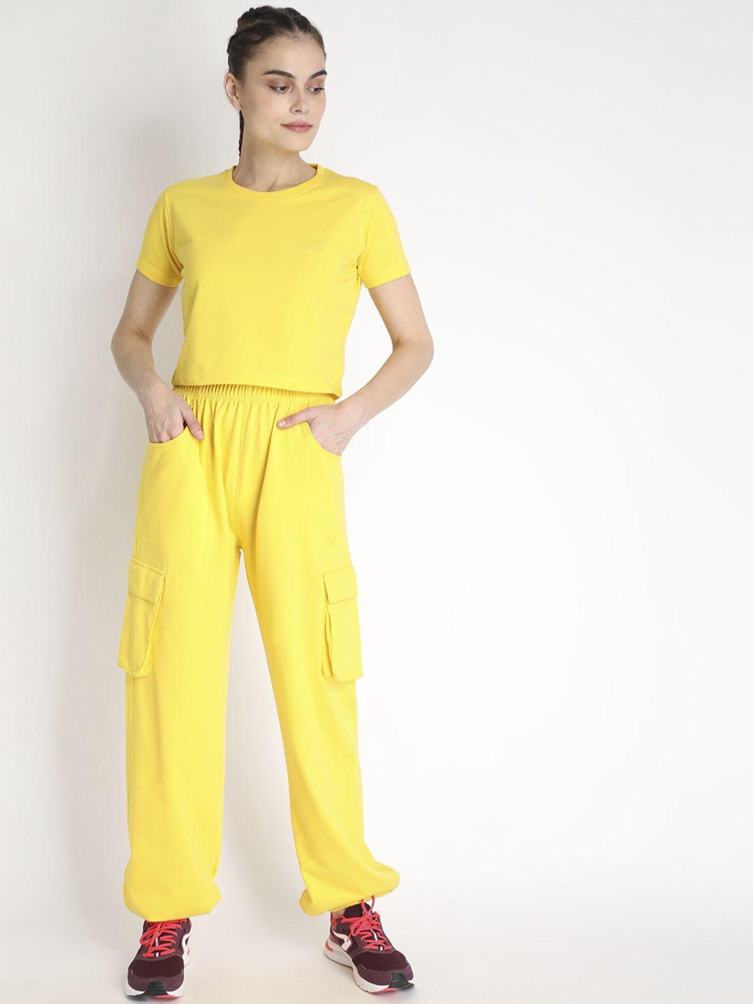 chkokko women yellow solid regular fit tracksuit