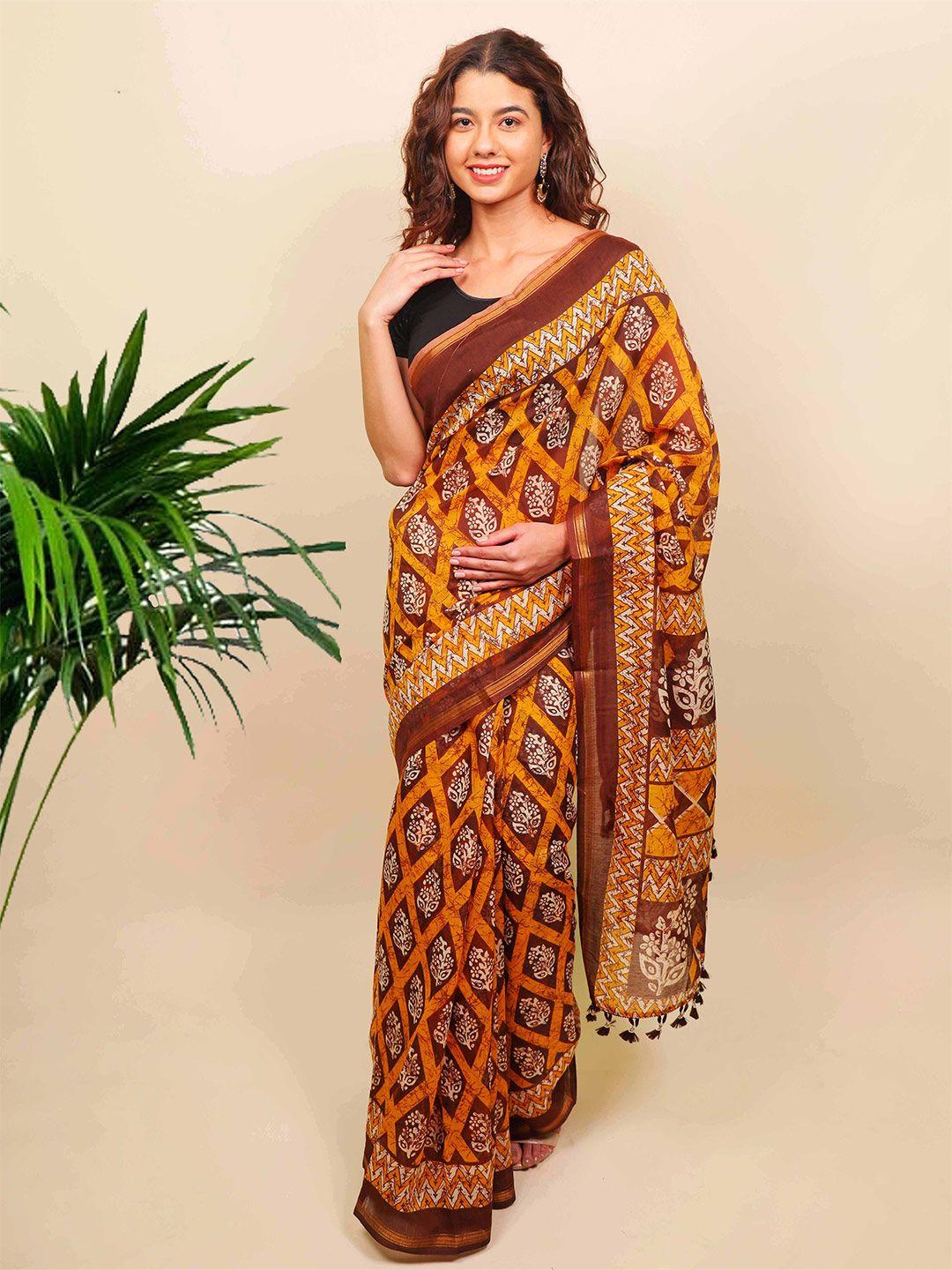 indi inside brown & yellow dabu saree