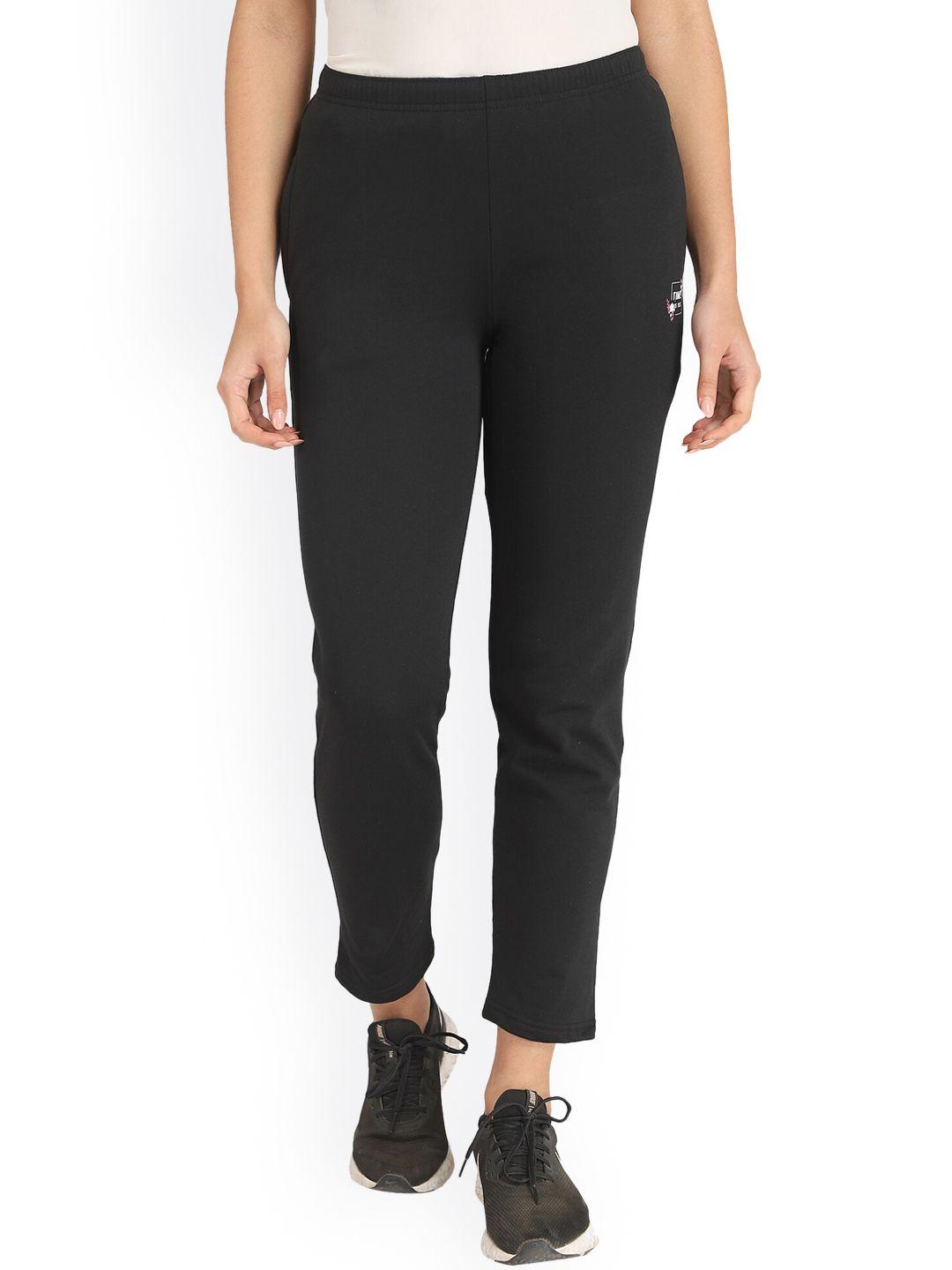 dyca women black solid cotton track pants