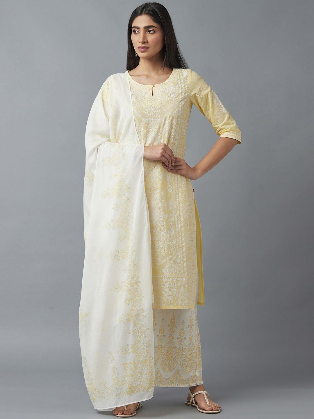 w women yellow printed thread work pure cotton kurti with trousers & with dupatta