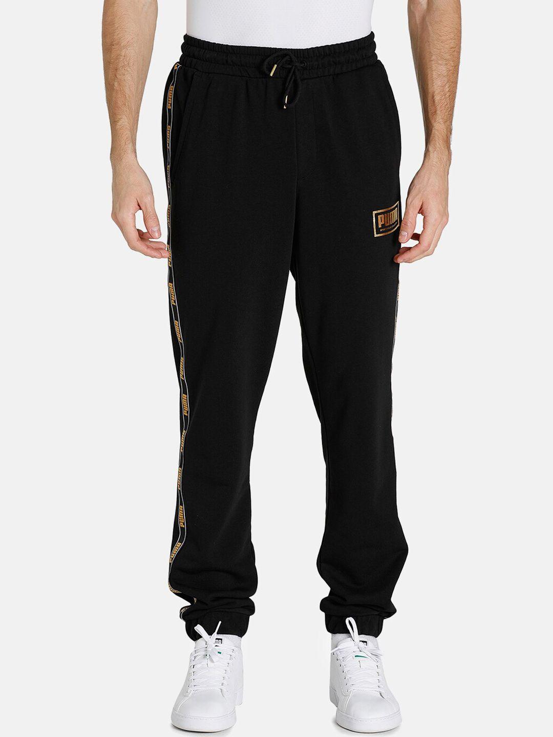 puma men black solid track pant