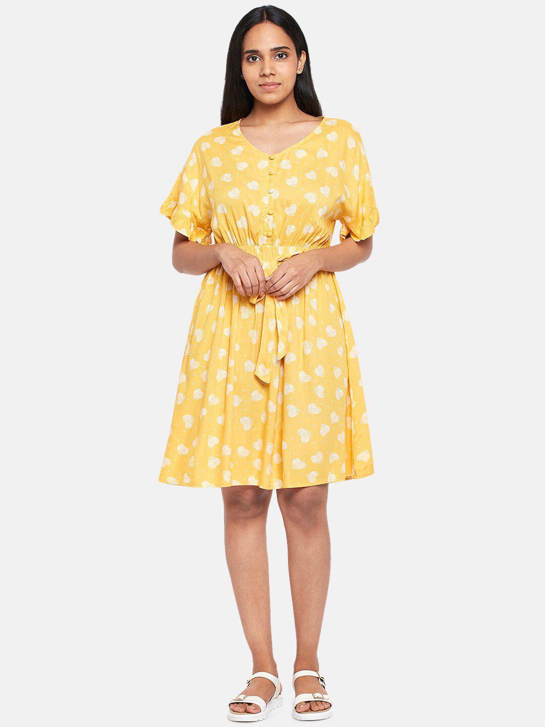 people mustard yellow floral dress