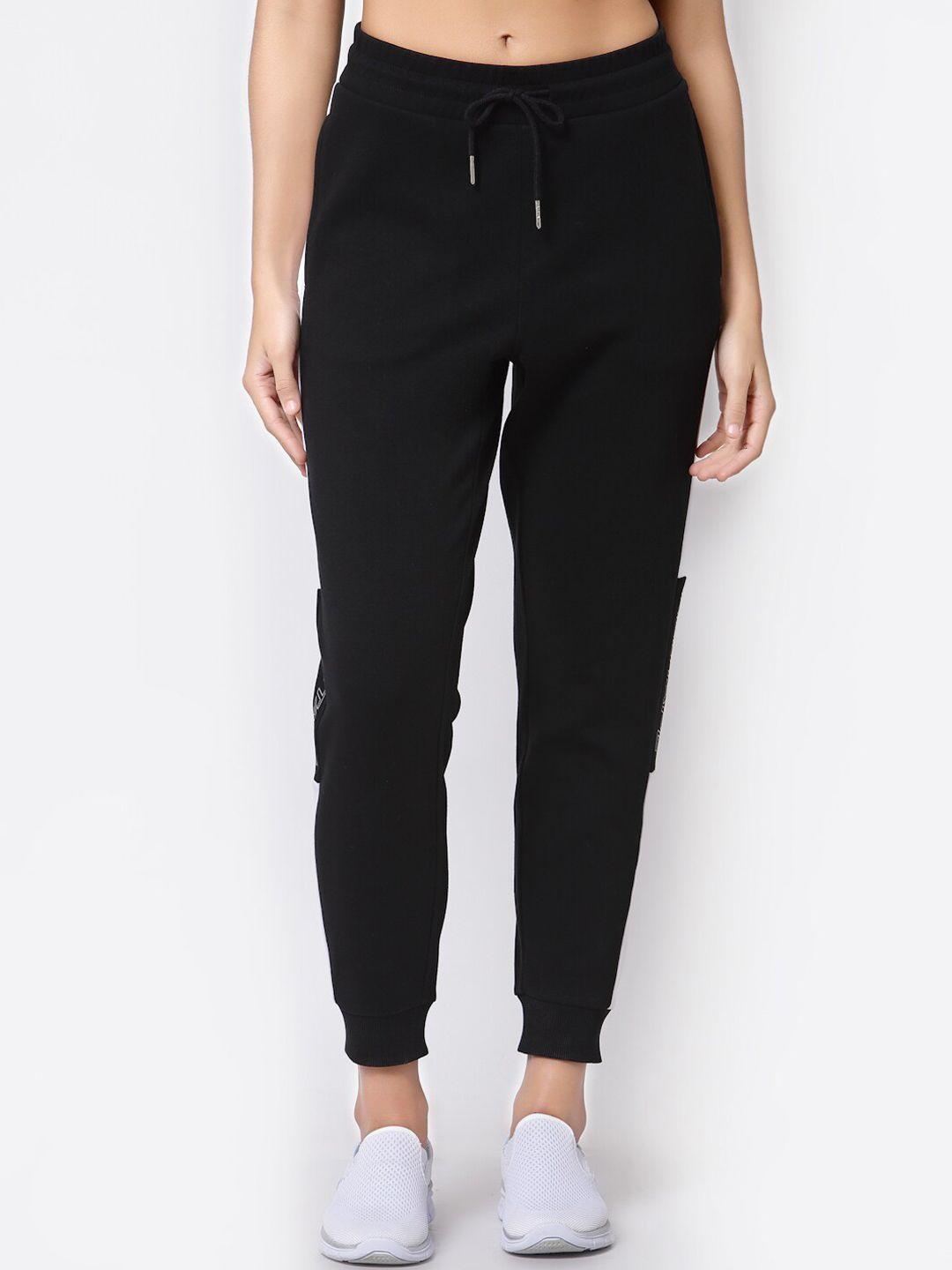 mode by red tape women black solid jogger