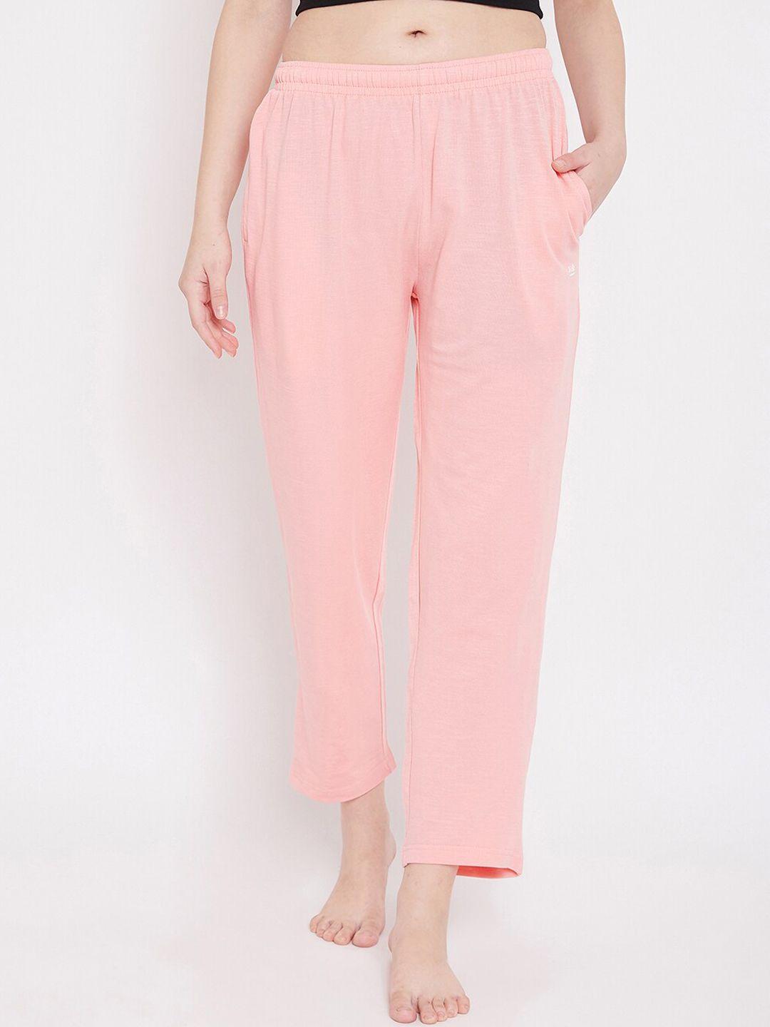 okane women peach-coloured solid cotton lounge pants