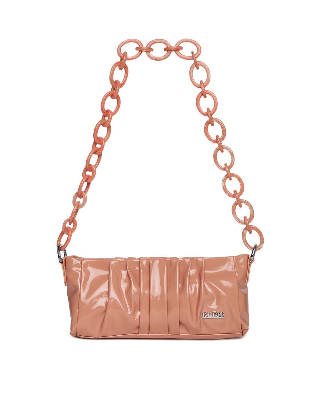 kleio peach-coloured pu bowling handheld bag