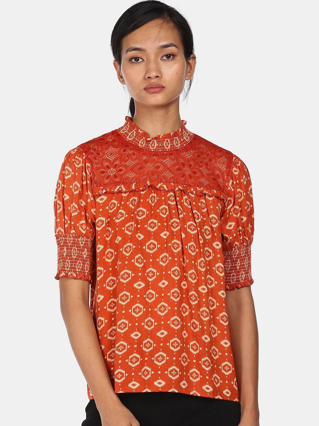 cherokee girls rust orange & beige smoked ethnic motifs printed top