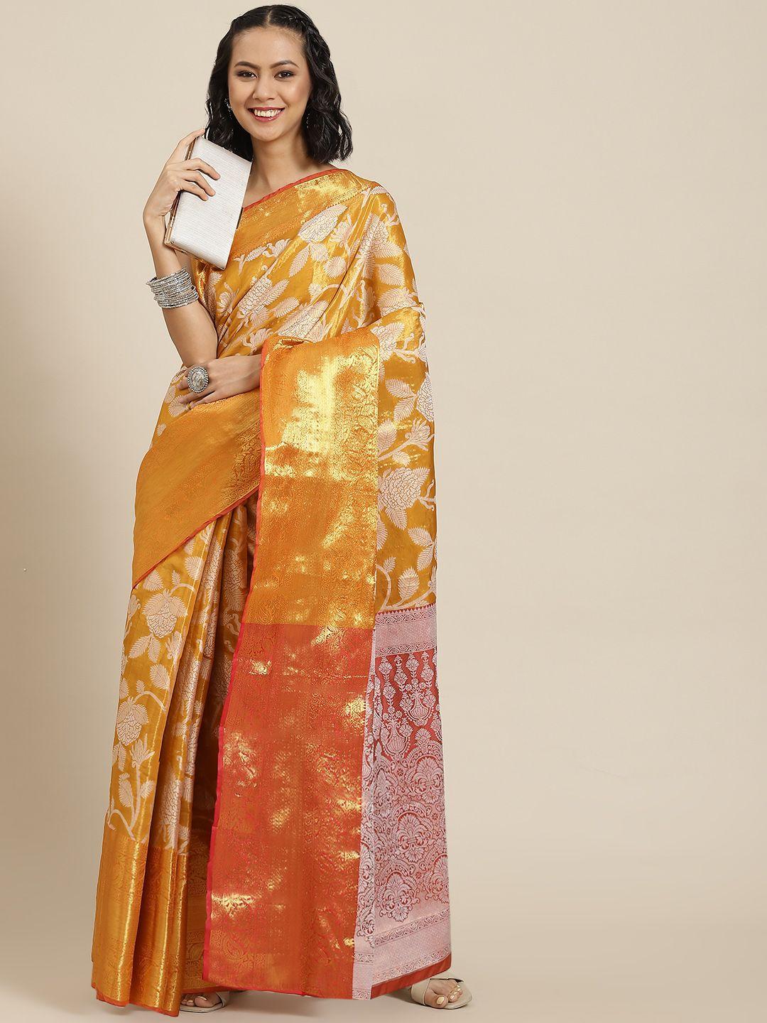 silk land orange floral zari pure silk ikat saree