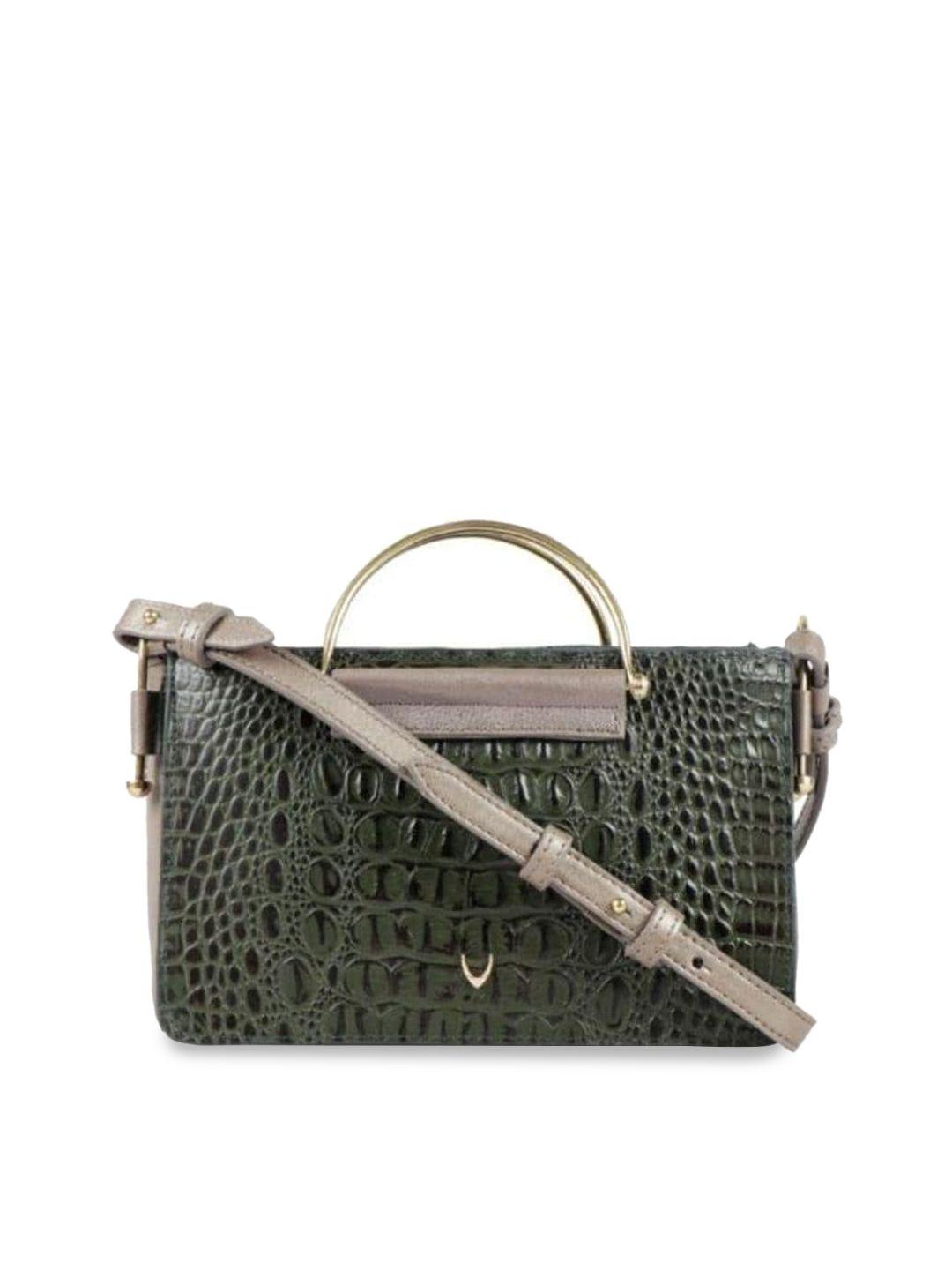 hidesign green textured leather swagger handheld bag with cut work