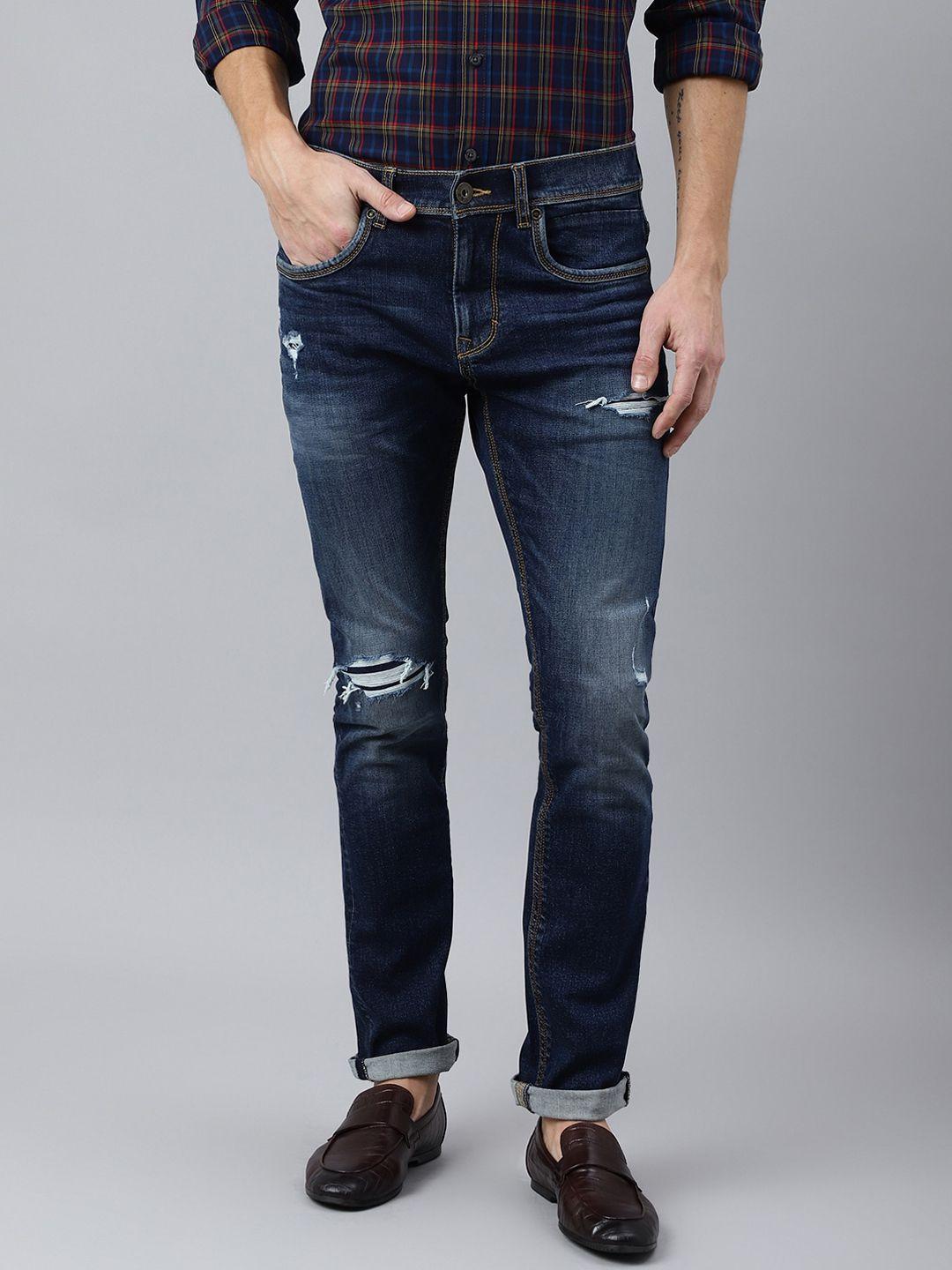 woodland men blue mildly distressed light fade stretchable jeans