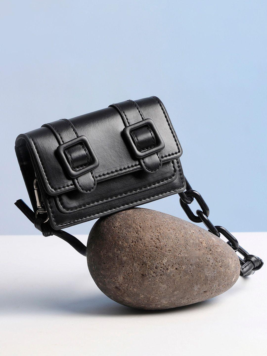 haute sauce by campus sutra black sling bag