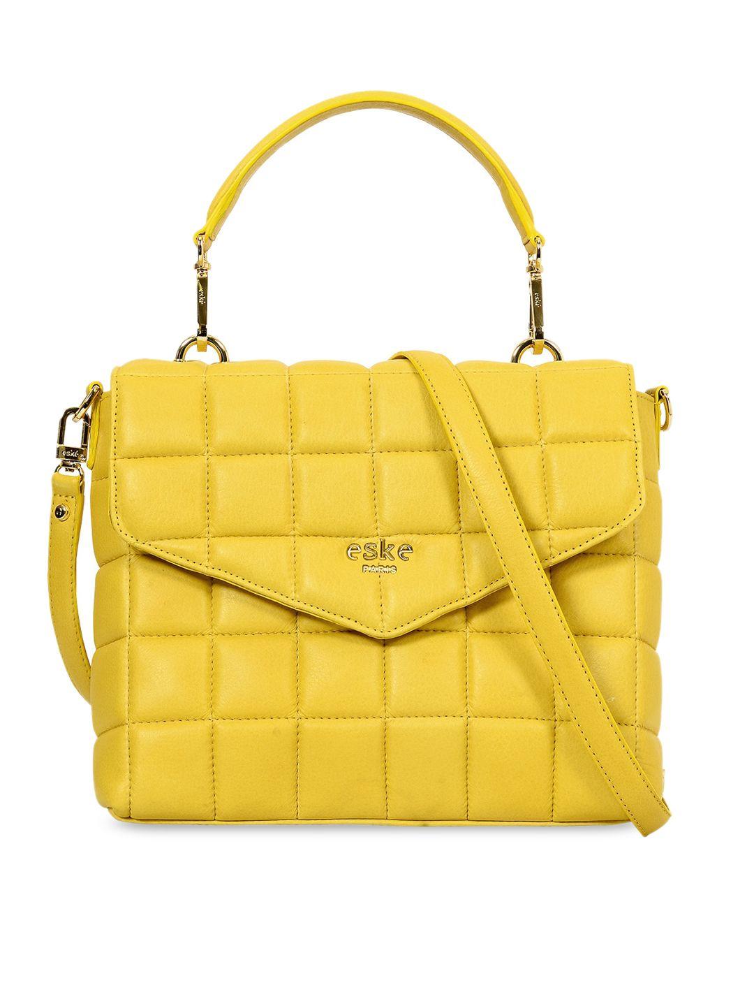 eske yellow leather structured satchel with quilted