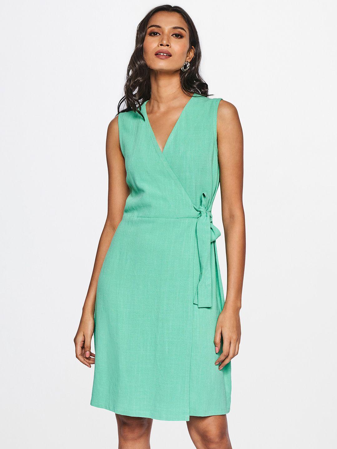 and women green solid wrap dress