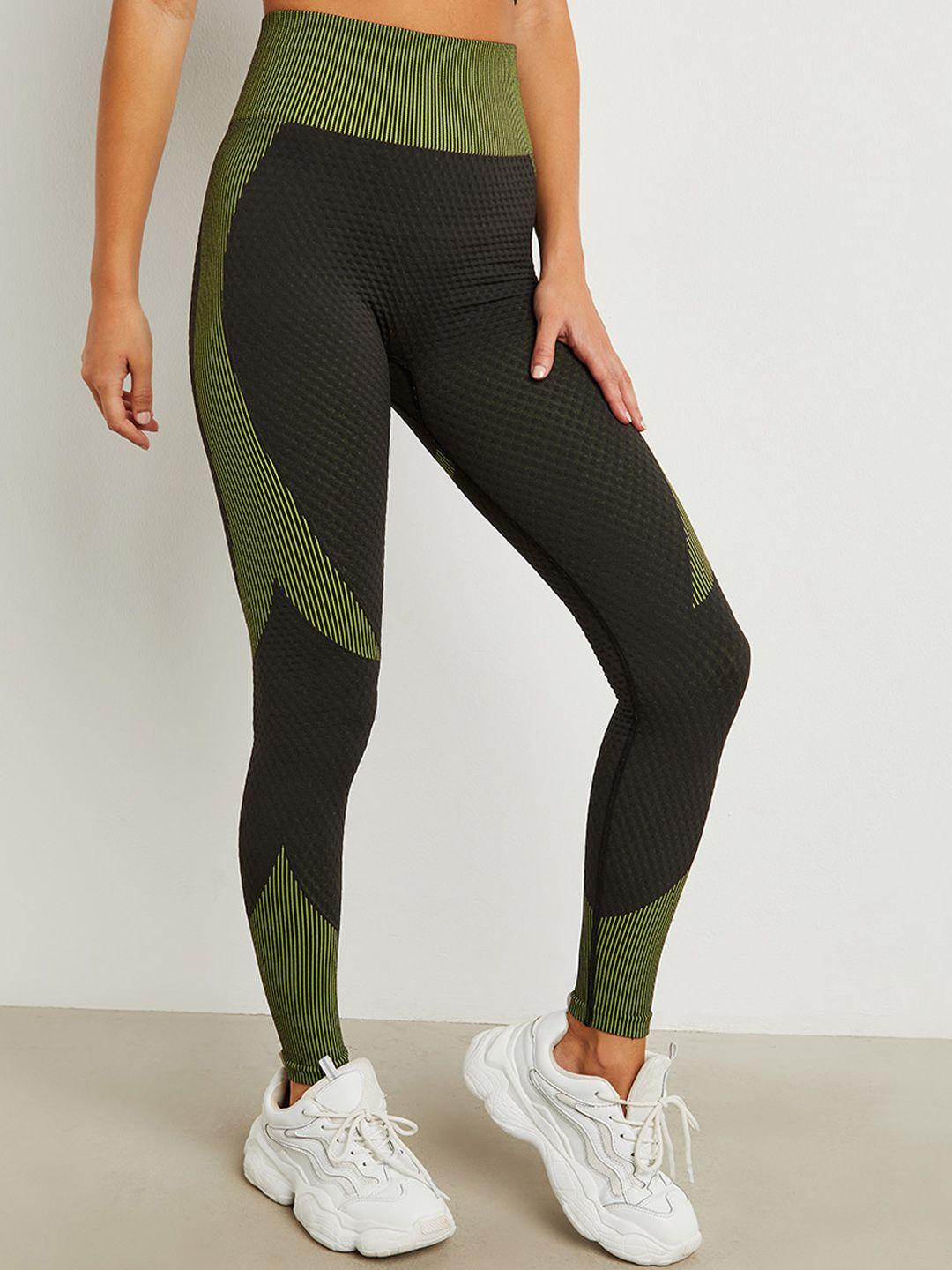 styli women black & green contrast waist insert sports tights