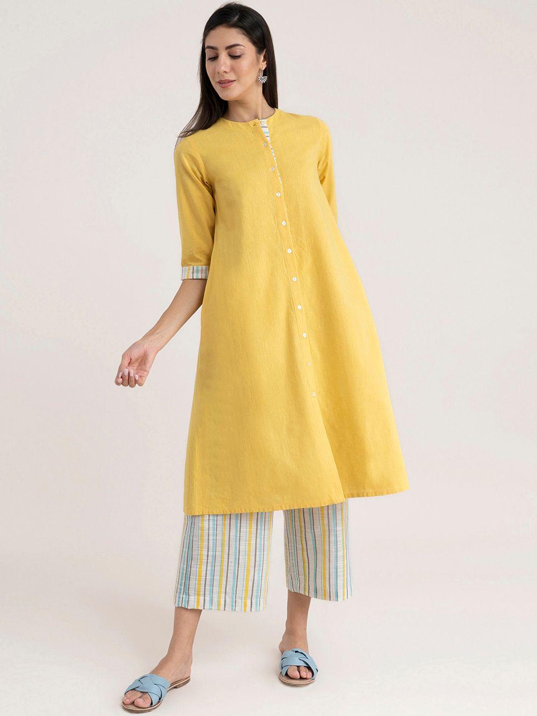 pink fort women yellow striped high slit kurti with palazzos