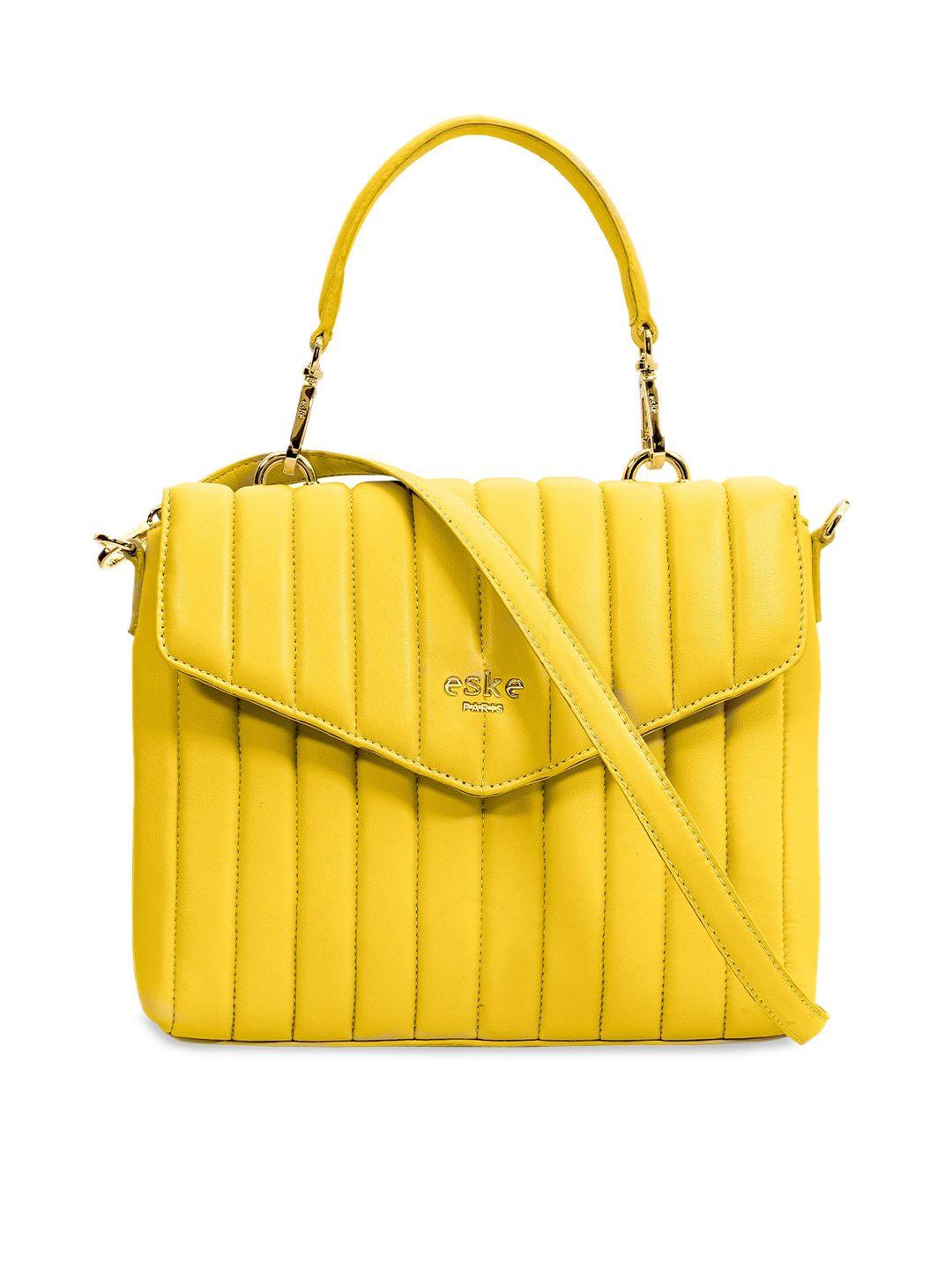 eske yellow textured leather structured handheld bag with quilted