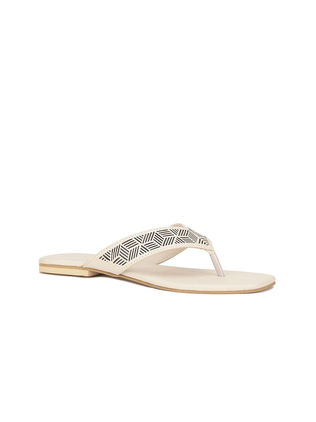 bata women off white laser cuts flats