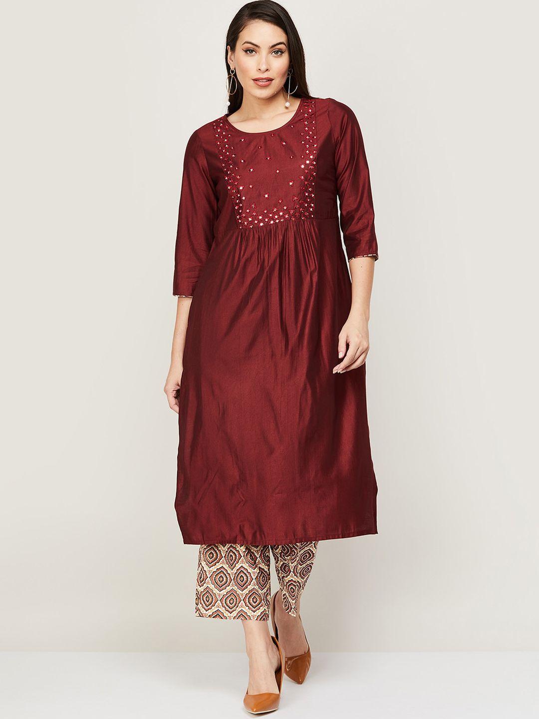 melange by lifestyle women red embroidered pleated kurti with trousers