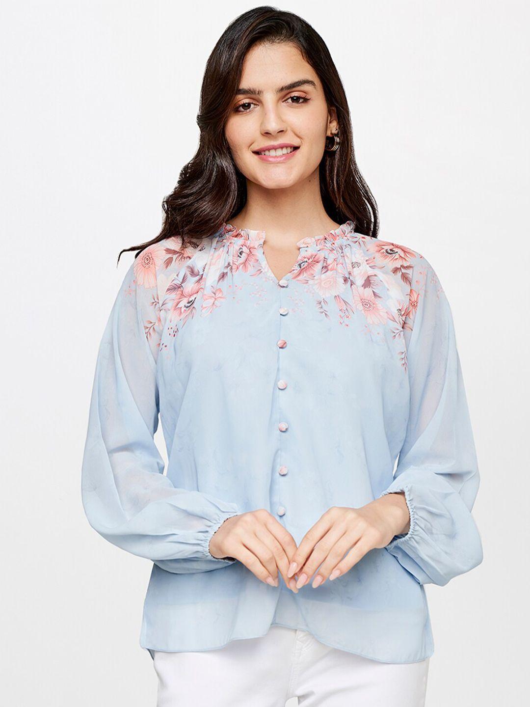 and women blue floral top