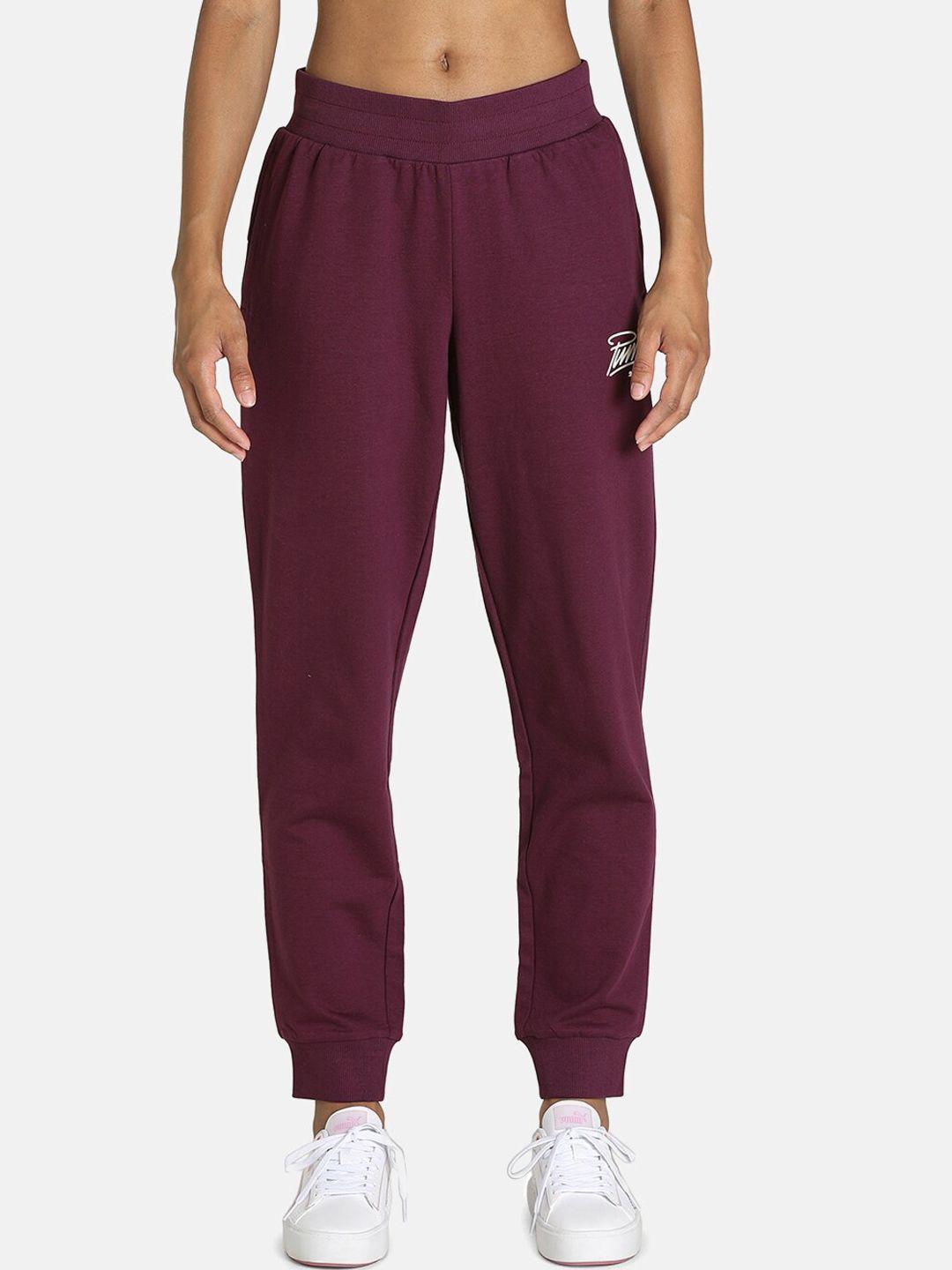 puma women purple solid cotton graphic logo joggers