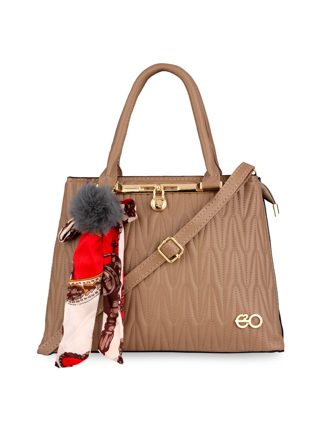 e2o taupe textured pu structured handheld bag with tasselled detail