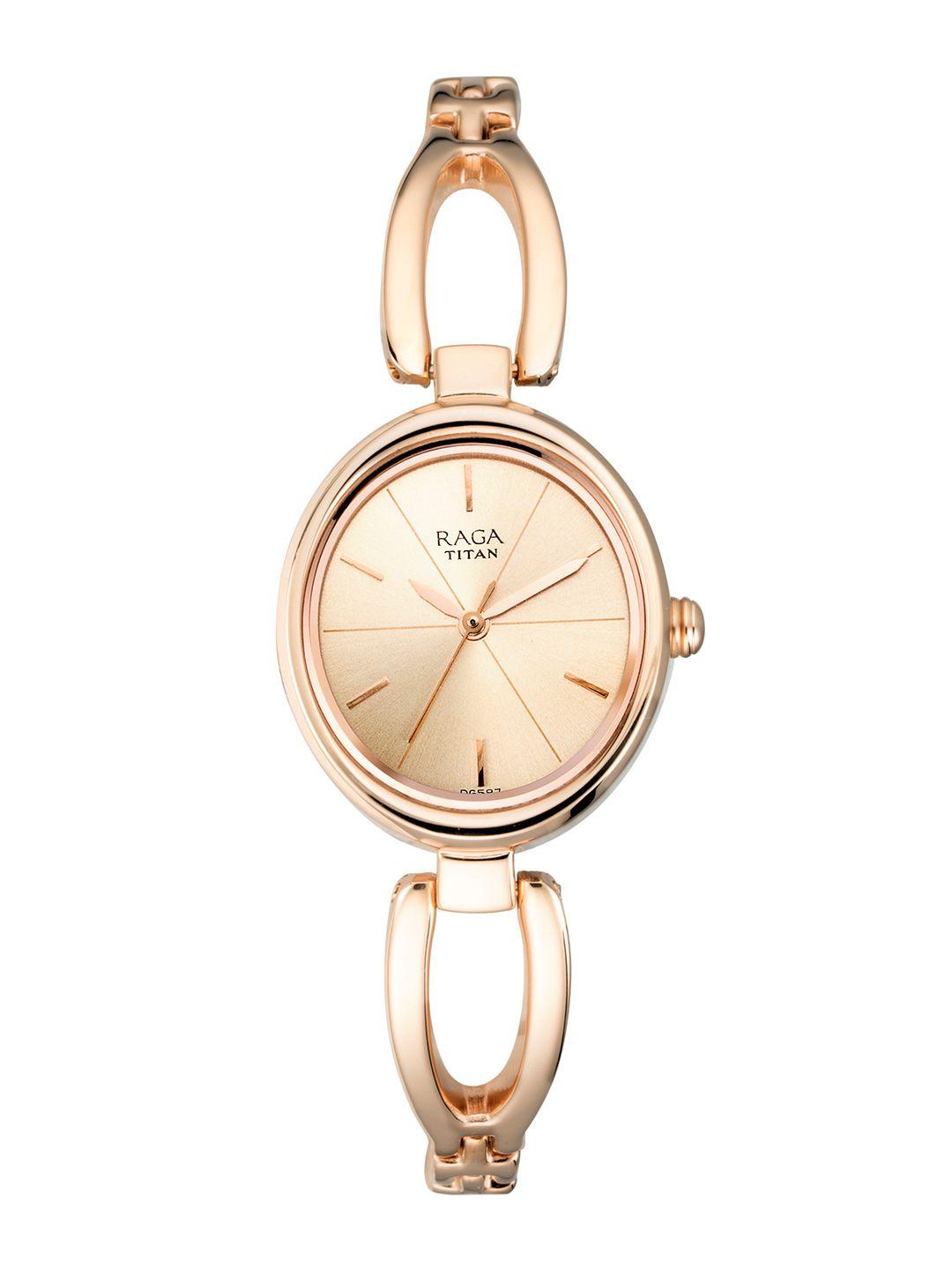 titan raga women rose gold-toned analogue watch 2579wm01