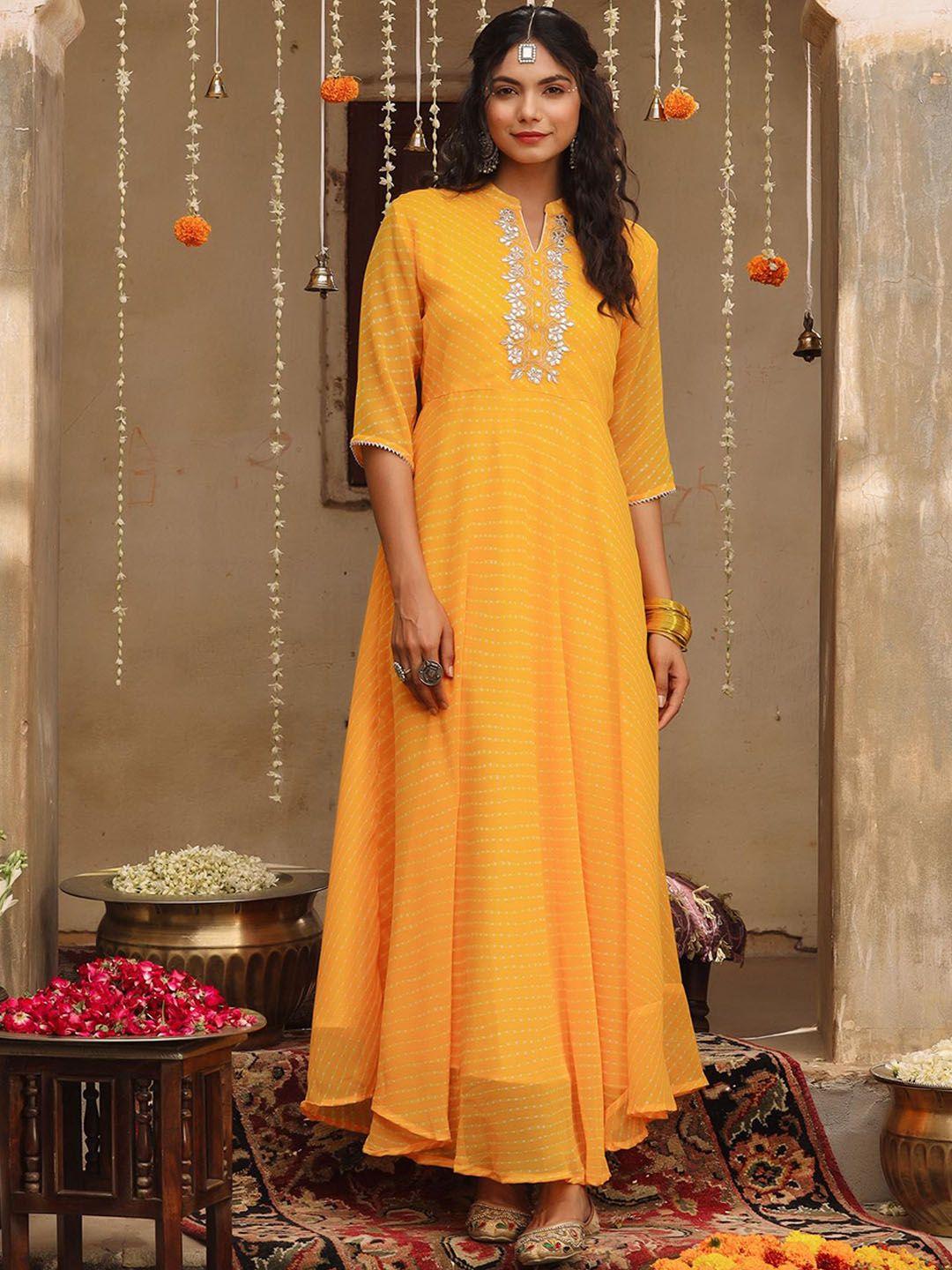 scakhi women mustard yellow keyhole neck summer sheers georgette anarkali kurta