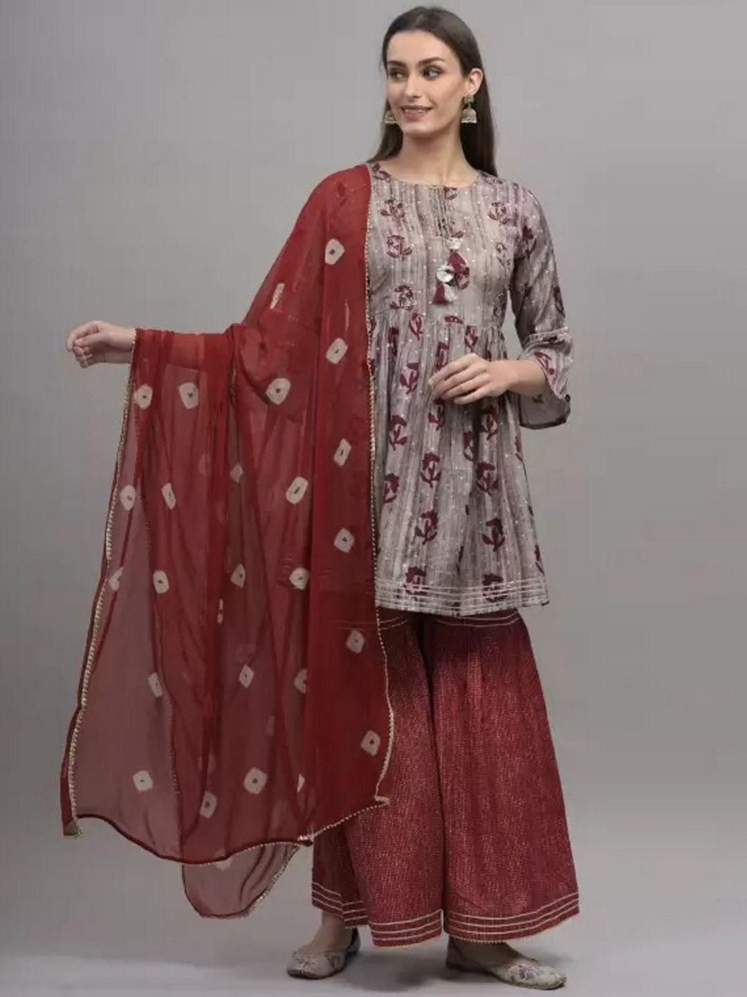 etnicawear women red floral kurta with sharara & with dupatta