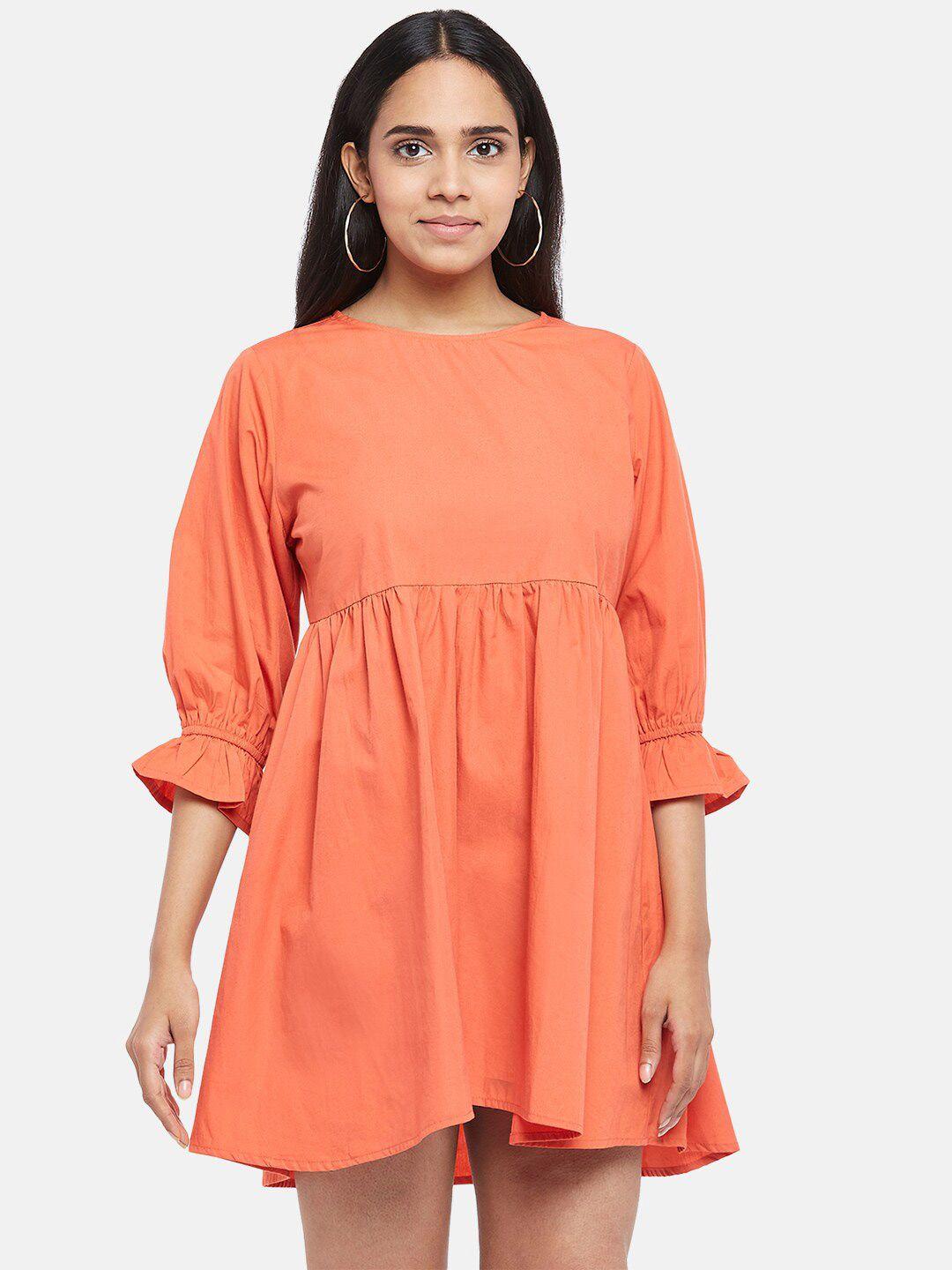 people women orange dress