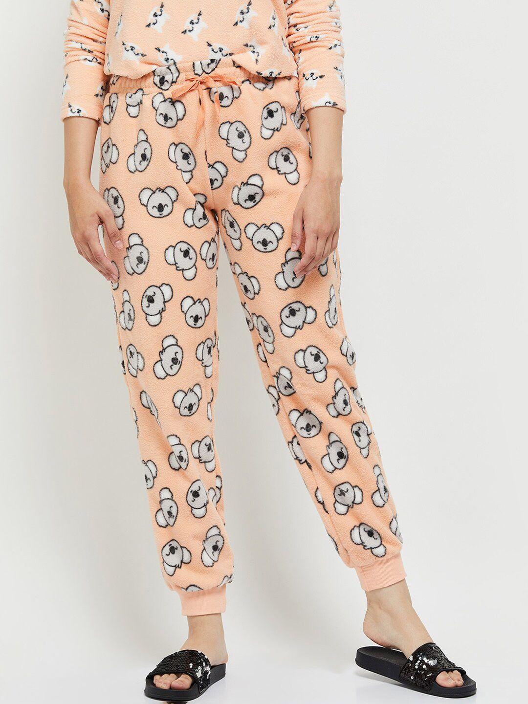 max women peach printed fleece lounge pants