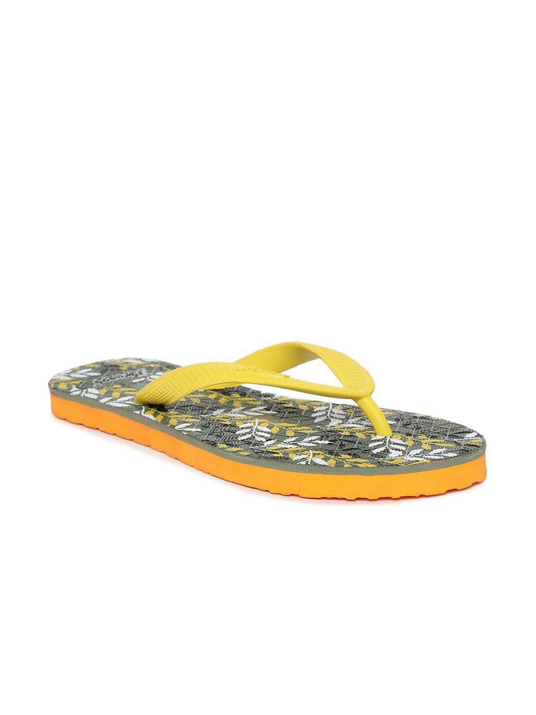 paragon women yellow & black printed rubber thong flip-flops