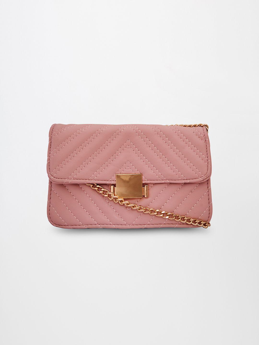 global desi pink textured swagger handheld bag with quilted