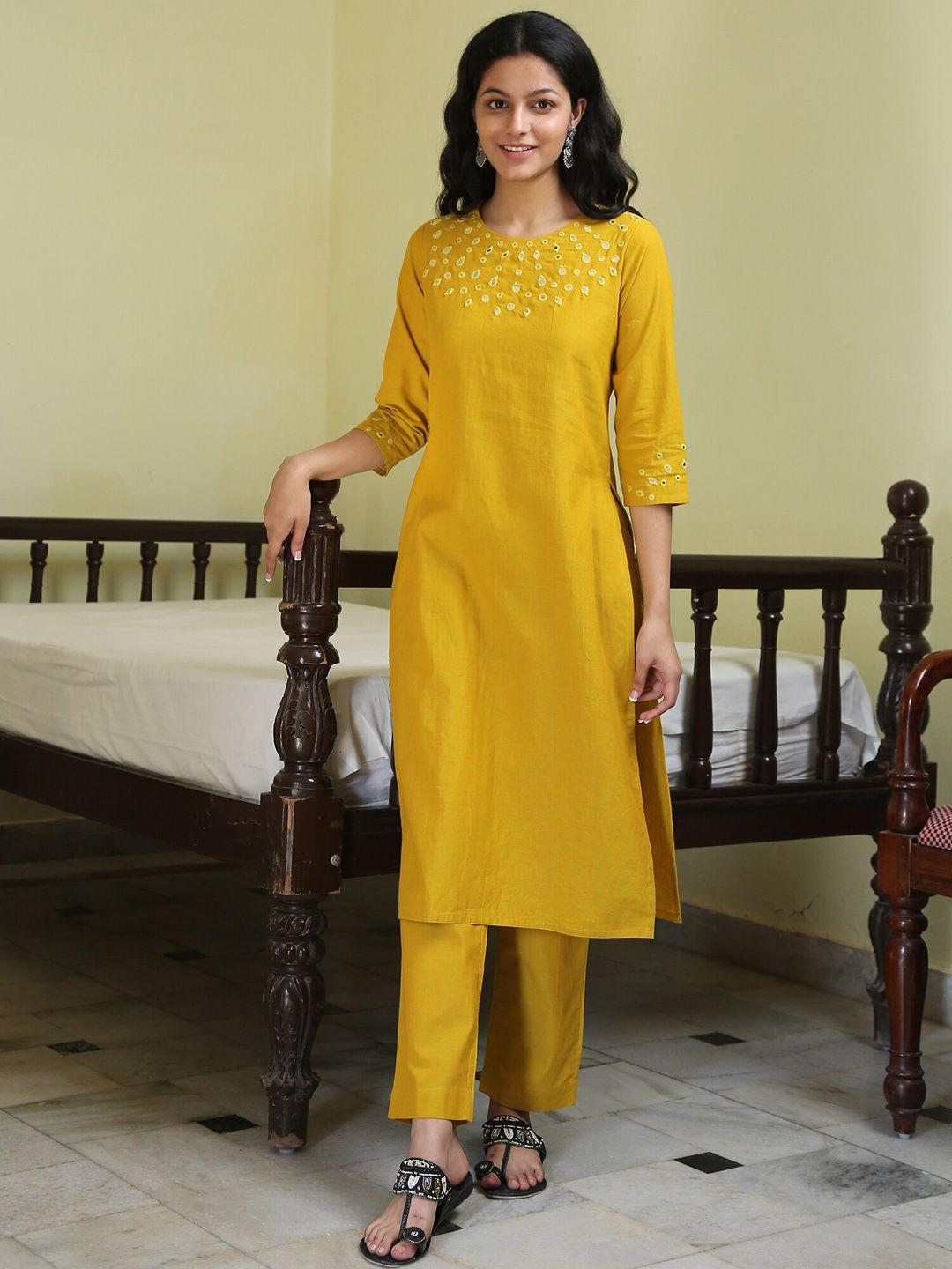 okhai women yellow ethnic motifs embroidered mirror work pure cotton kurta with trousers