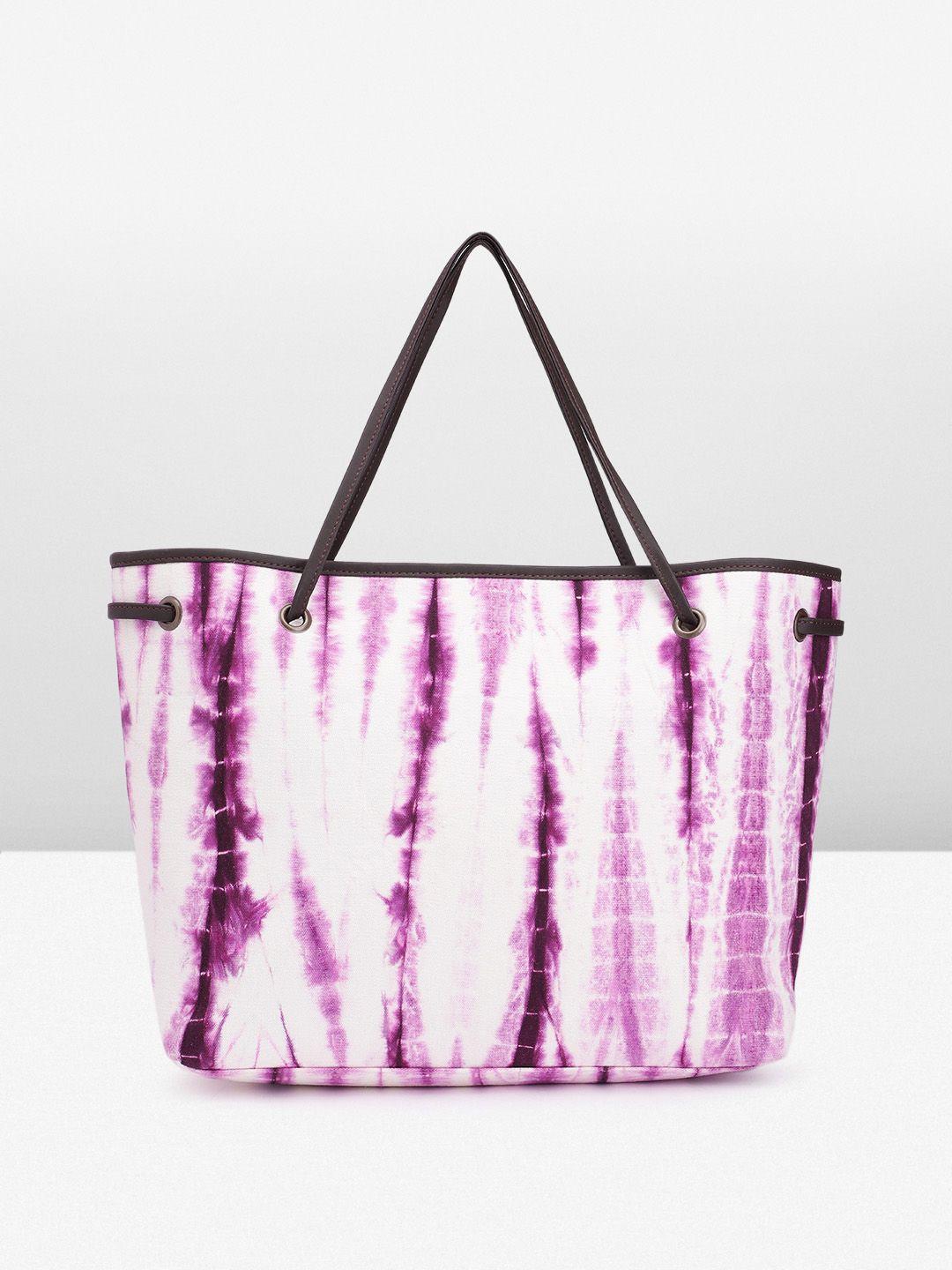 taavi women printed handheld bag