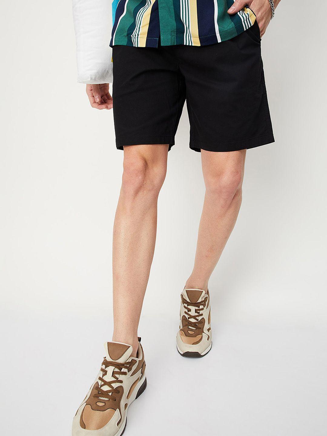 max men solid mid rise regular shorts