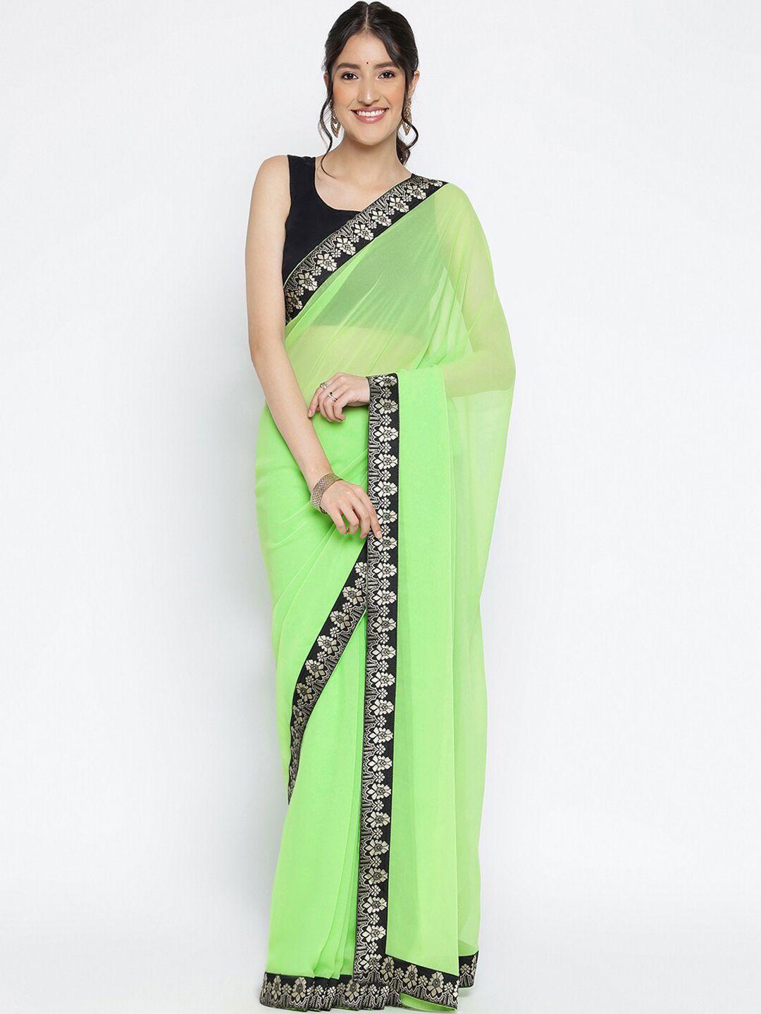 ambuja international sea green & black zari pure georgette saree