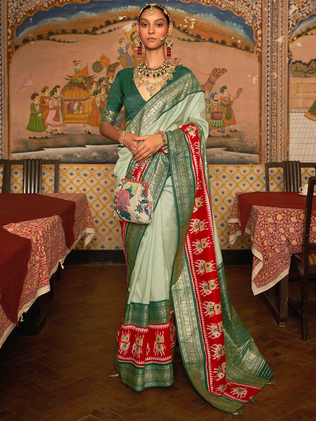 anouk green & red zari silk blend patola saree