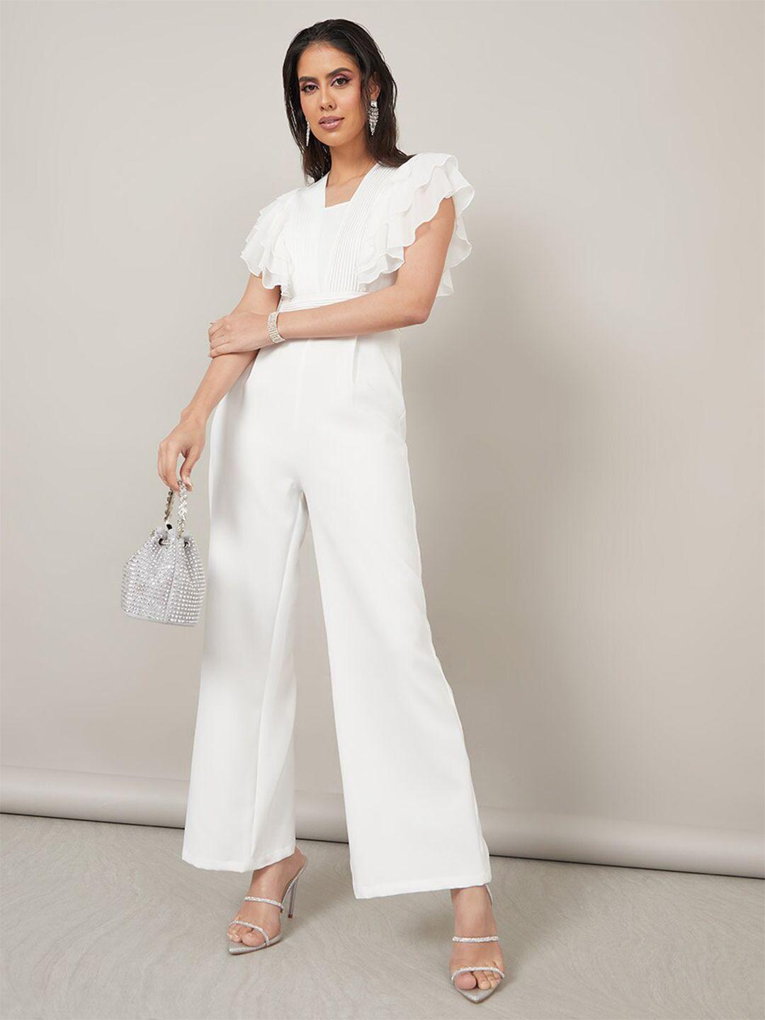 styli white basic jumpsuit with ruffles