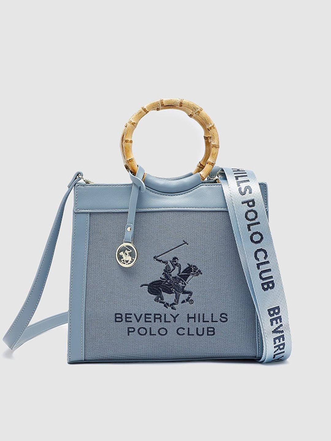 beverly hills polo club violet printed pu swagger handheld bag with cut work