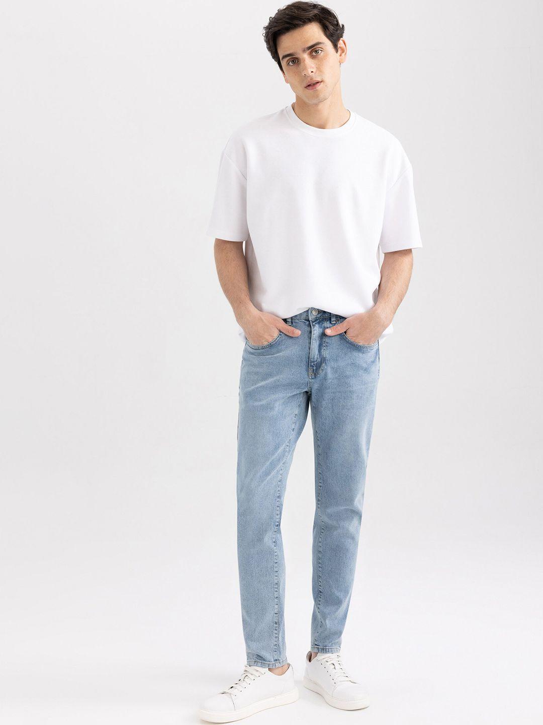 defacto men mid-rise clean look stretchable light shade jeans